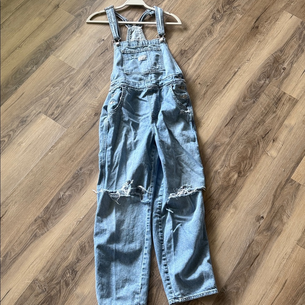 Levi's Light Blue Distressed Denim Overalls Back Pocket Detail